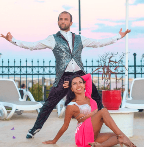 Juan Colmenares and Nathaly Baron Torres dancing together